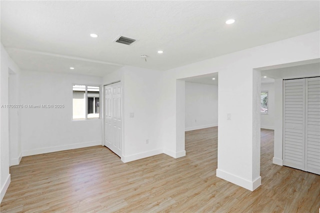 empty room featuring light hardwood / wood-style floors