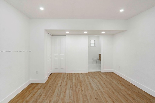 unfurnished room featuring light hardwood / wood-style floors