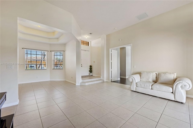 living room with light tile patterned floors