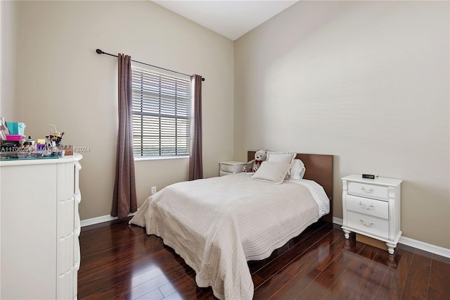 bedroom featuring dark wood-type flooring