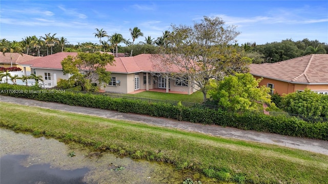 single story home with a front yard