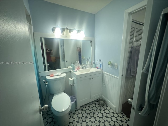 bathroom with vanity and toilet