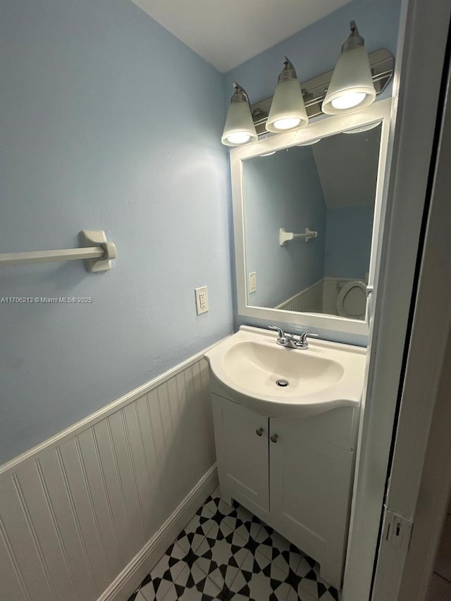 bathroom featuring vanity and tile patterned flooring