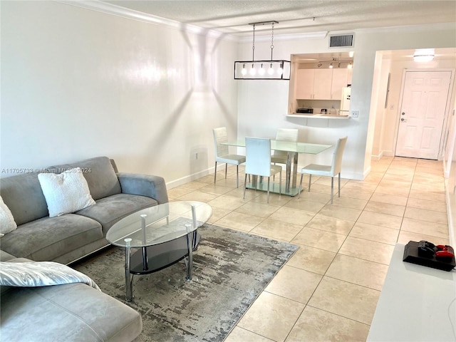 living room featuring light tile patterned floors and crown molding