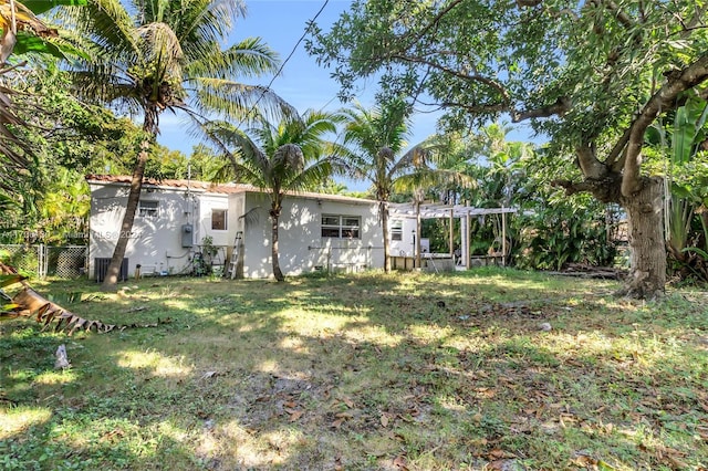 exterior space with a front lawn