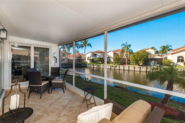 sunroom with a water view