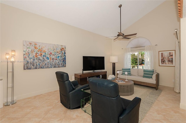 tiled living room featuring high vaulted ceiling and ceiling fan