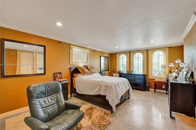 bedroom with a textured ceiling and crown molding