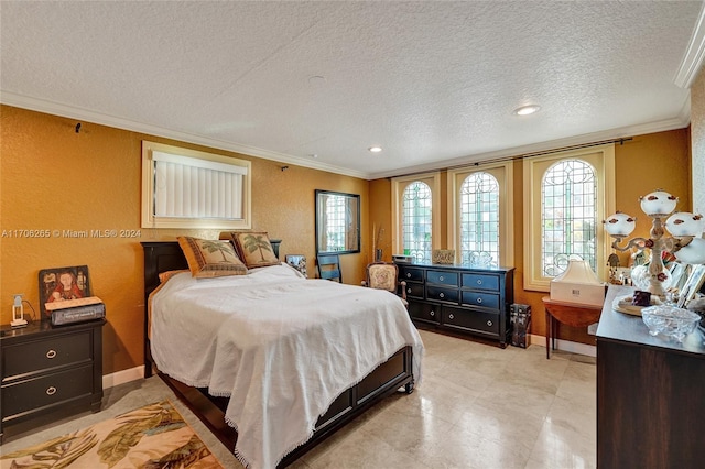 bedroom with ornamental molding and a textured ceiling