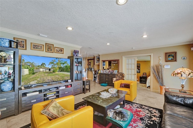 living room featuring french doors, a textured ceiling, and ornamental molding