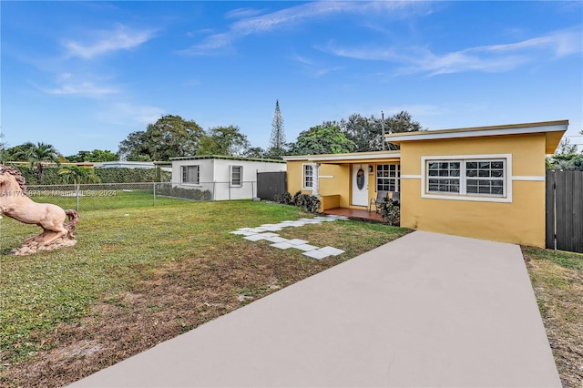 view of front of property with a front lawn