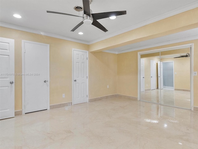 empty room with crown molding and ceiling fan