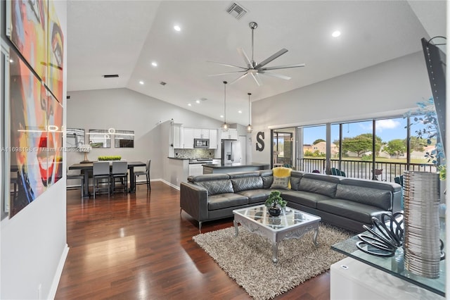 living room featuring ceiling fan, dark wood-type flooring, and high vaulted ceiling