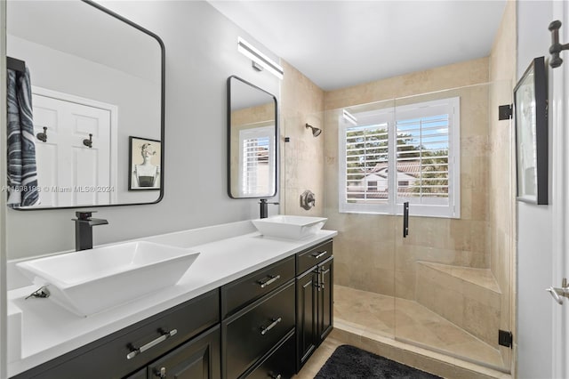 bathroom with vanity and an enclosed shower