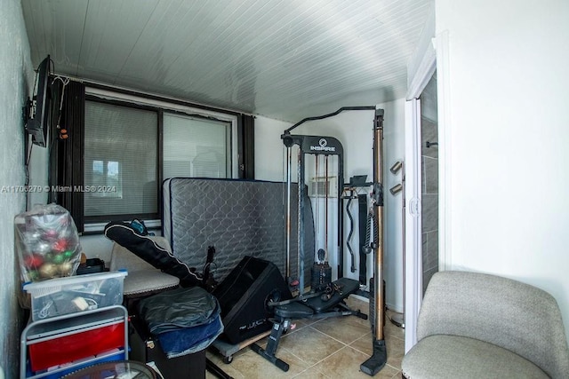 exercise area with light tile patterned floors