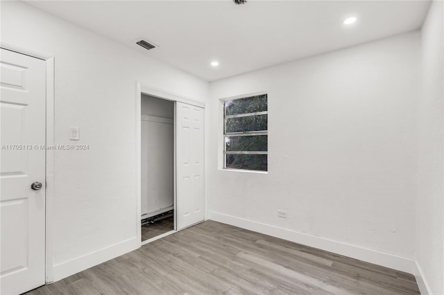 unfurnished bedroom featuring light hardwood / wood-style flooring