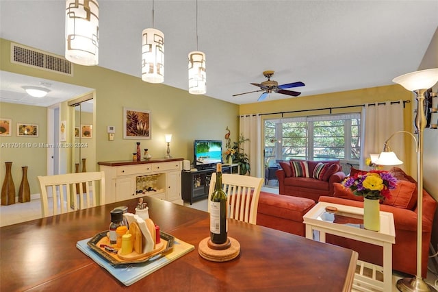 dining room featuring ceiling fan