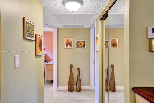 hallway with light tile patterned flooring