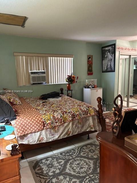 tiled bedroom featuring cooling unit