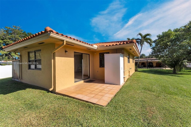 50 SW 130th Ave, Miami, FL 33184 - back of property with a yard and a patio