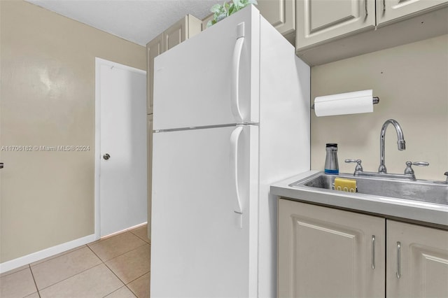 50 SW 130th Ave, Miami, FL 33184 - kitchen featuring sink, white fridge, and light tile patterned flooring