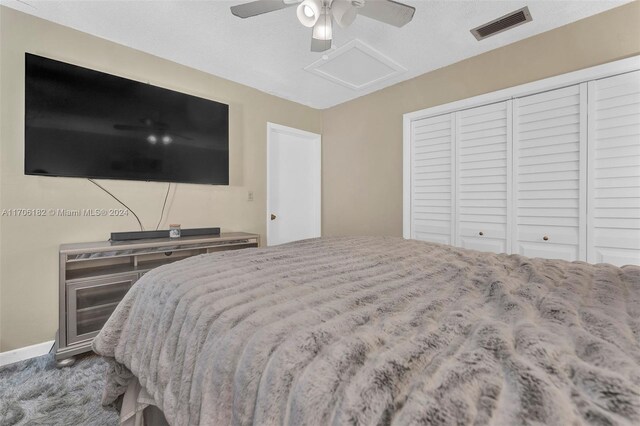 50 SW 130th Ave, Miami, FL 33184 - bedroom with carpet flooring, ceiling fan, a textured ceiling, and a closet