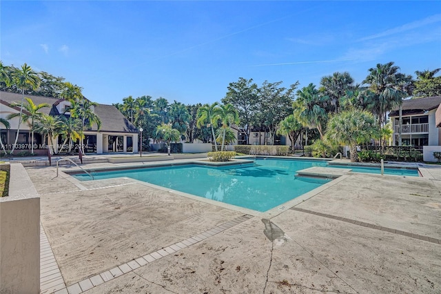 view of pool featuring a patio area