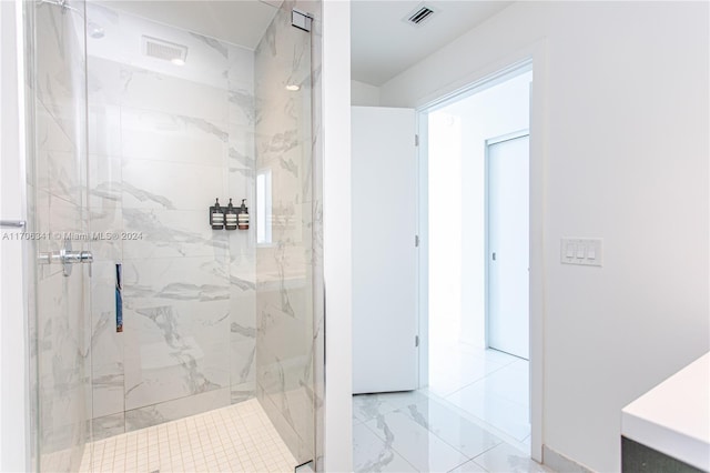 bathroom with an enclosed shower