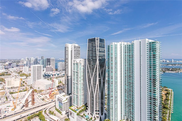 property's view of city with a water view