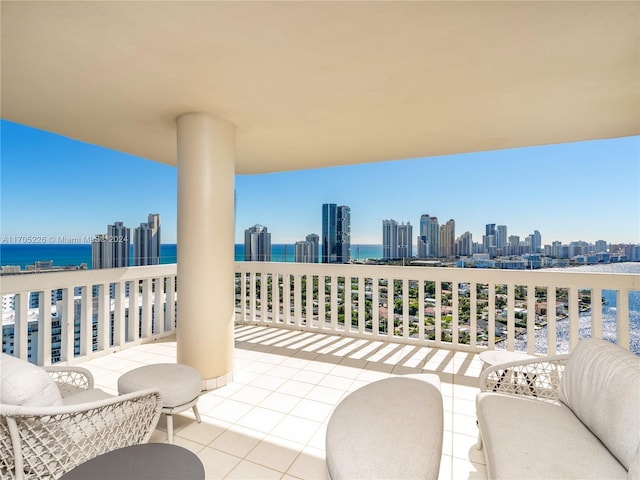 balcony featuring a water view