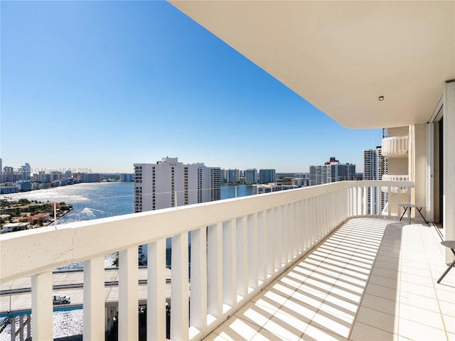 balcony featuring a water view