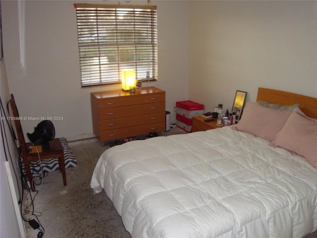 bedroom featuring light carpet