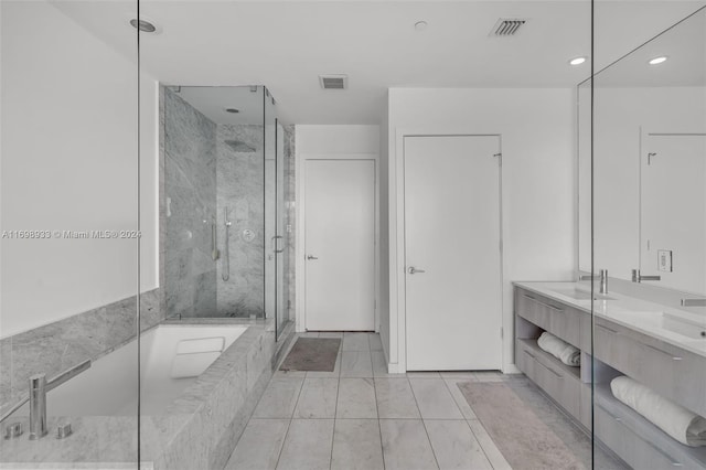 bathroom featuring separate shower and tub and vanity