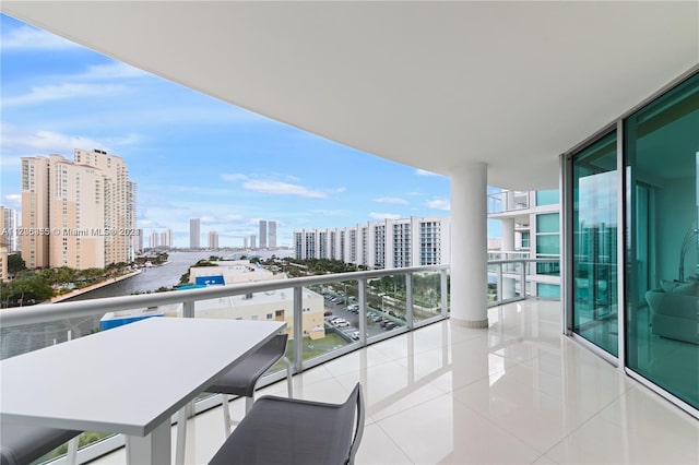 balcony featuring a water view