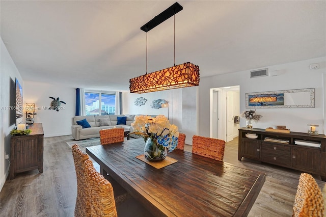 dining area featuring hardwood / wood-style flooring