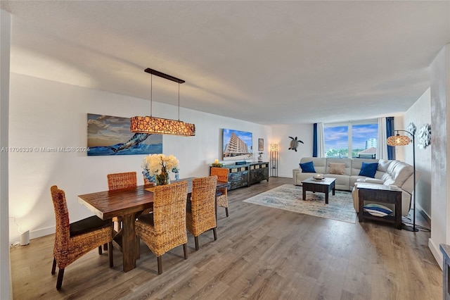 dining room with hardwood / wood-style floors