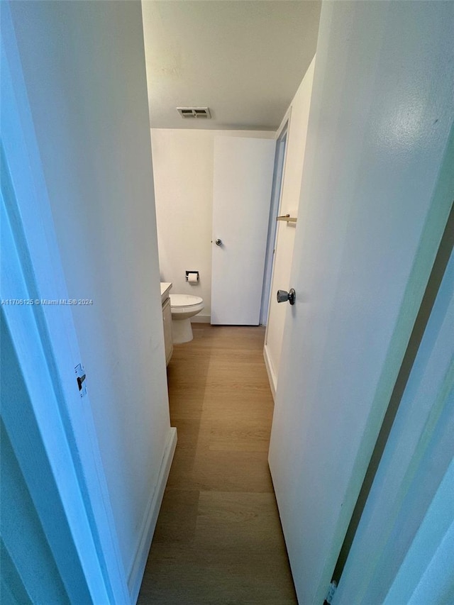 hall featuring light hardwood / wood-style floors