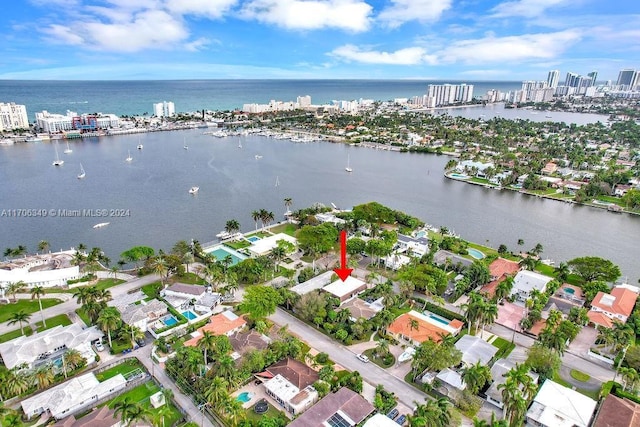 drone / aerial view with a water view