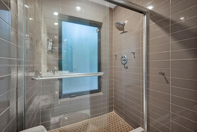 bathroom with an enclosed shower