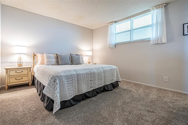 carpeted bedroom featuring a textured ceiling and baseboards