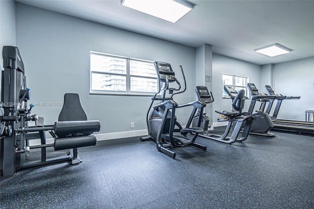 workout area featuring a wealth of natural light