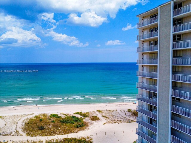 view of water feature with a beach view