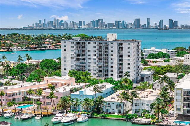 birds eye view of property featuring a water view