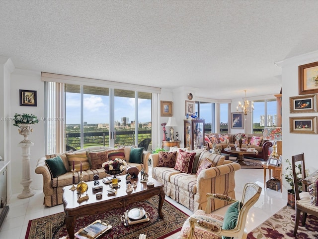 living room with a textured ceiling, an inviting chandelier, light tile patterned floors, and floor to ceiling windows