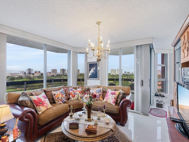 living room featuring floor to ceiling windows, a textured ceiling, light tile patterned floors, and an inviting chandelier