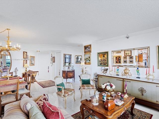 living room with a textured ceiling, light tile patterned floors, ornamental molding, and a notable chandelier