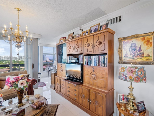 living room featuring a textured ceiling, light tile patterned floors, crown molding, and a notable chandelier