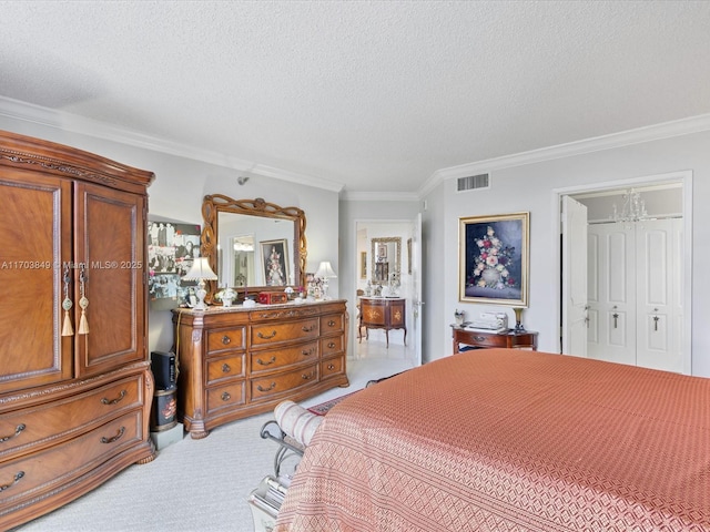 carpeted bedroom with a closet, a textured ceiling, and ornamental molding