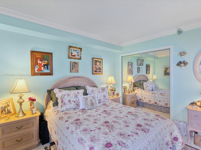 bedroom with a closet and ornamental molding