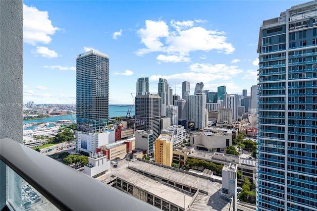 property's view of city featuring a water view